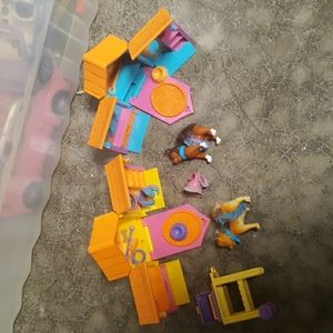 Polly pocket dogs and doghouses and accessories